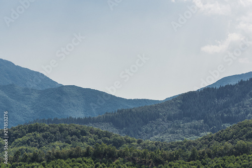 Fototapeta Naklejka Na Ścianę i Meble -  Peak mountain landscape with blue clouds sky