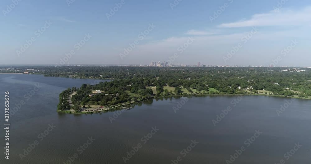 Aerial view of White Rock Lake and Downtown Dallas in the background. Aerial view of White Rock Lake and Downtown Dallas in the background.