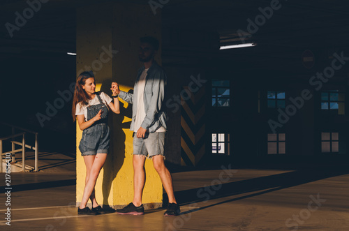 Young Woman making pranks on the parkingpranks photo