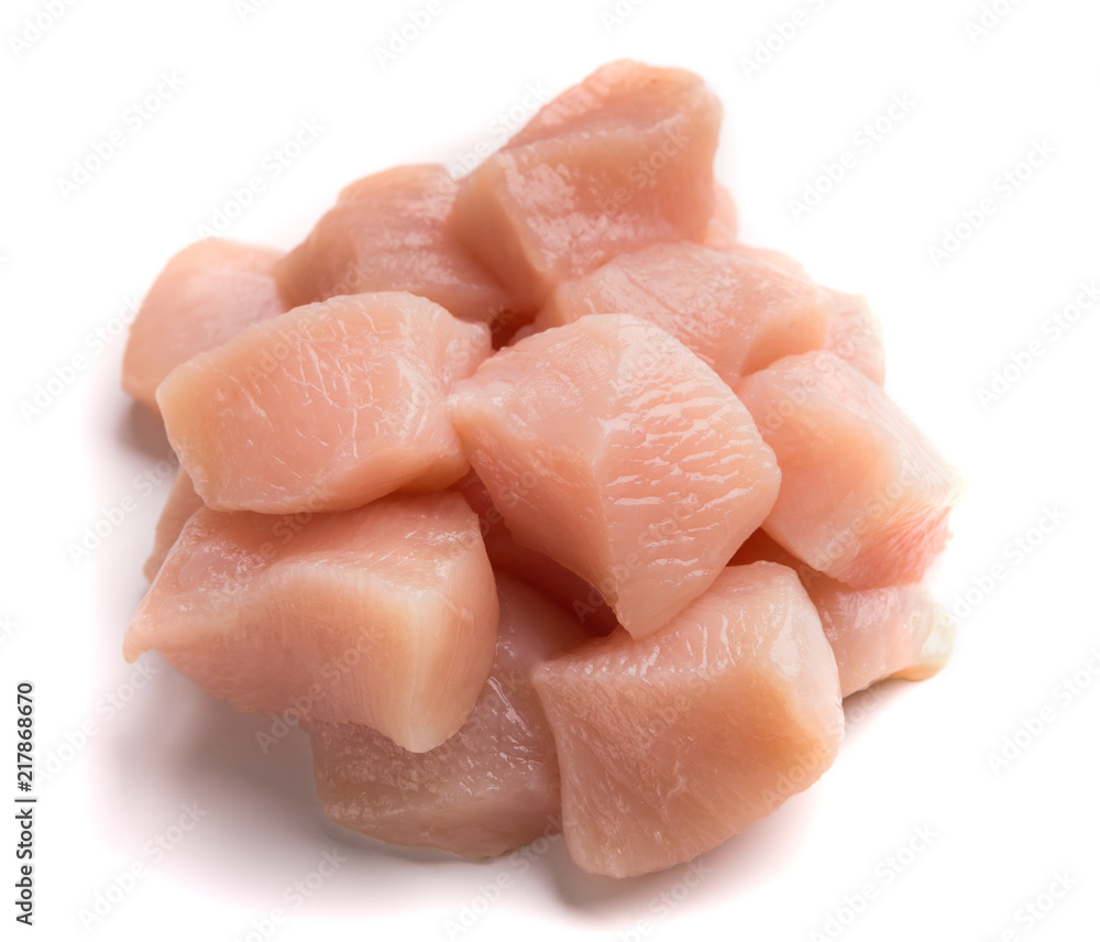 Raw chicken fillet chunks isolated