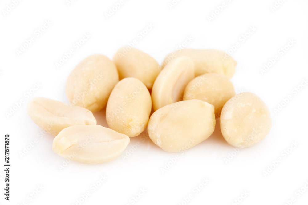 Peeled peanuts on a white background. Healthy food. Nuts. Peeled peanuts on a white background. Healthy food. Nuts.