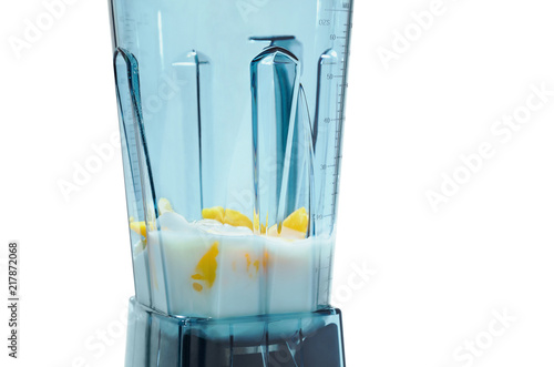 Mango and yogurt smoothie. Ingredients for smoothie in blender.