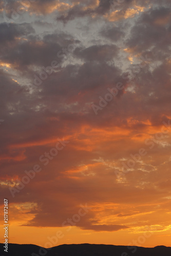 Orange cloudy sky during a sunset