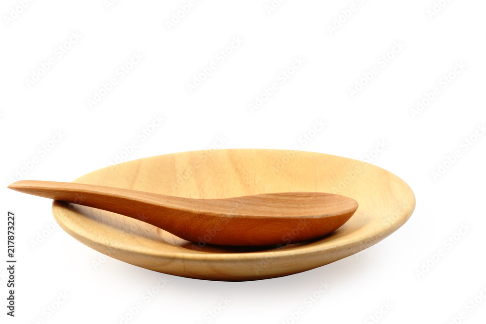 Wooden plate and tablespoon isolated clipping path. Wooden plate and tablespoon isolated clipping path.