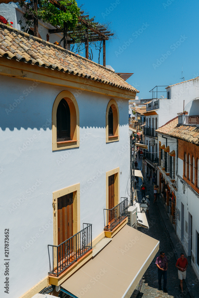 High perspective of narrow streets of the Jewish Quarter as part of Cordoba's historic center, which was declared a World Heritage Site by UNESCO
