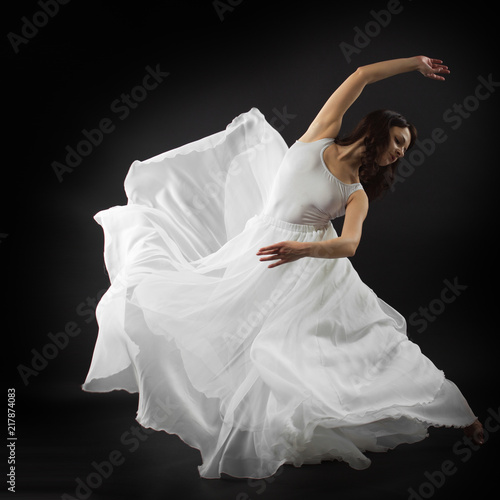 Young girl dancing ballet in studio. Dress, plastica