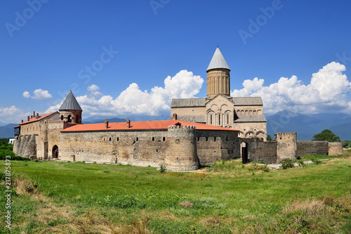 Georgia, Alaverdi Monastery ones of the biggest sacred objects in Georgia, located in Kakheti region, near the Telavi town. In the distance visible range of Kakazu mountains. photo