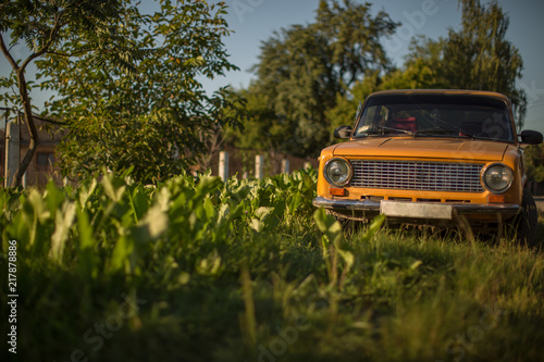 Old vintage car in the garden