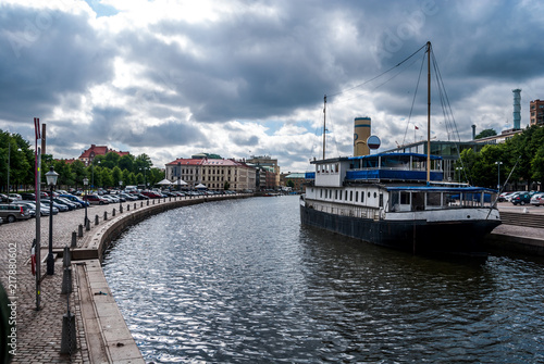 The canal and steamer before the rain © YPetukhov