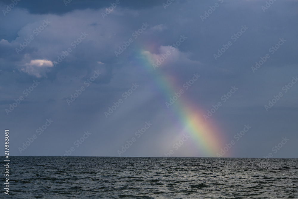 Rainbow under storm sea nature color ecology