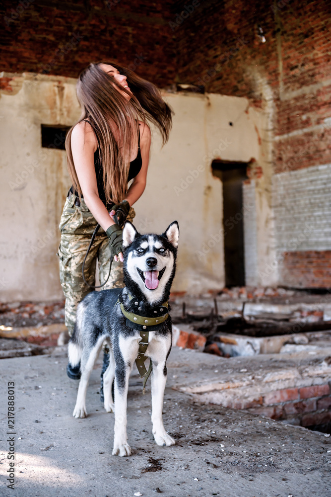 military sexy girl with dog (husky) Stock Photo | Adobe Stock