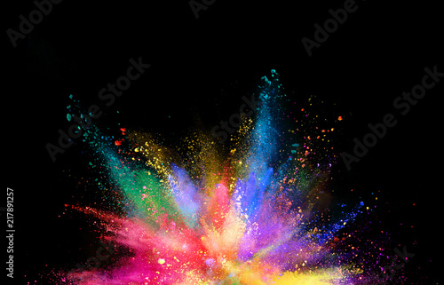Coloured powder explosion isolated on black background © Jag_cz