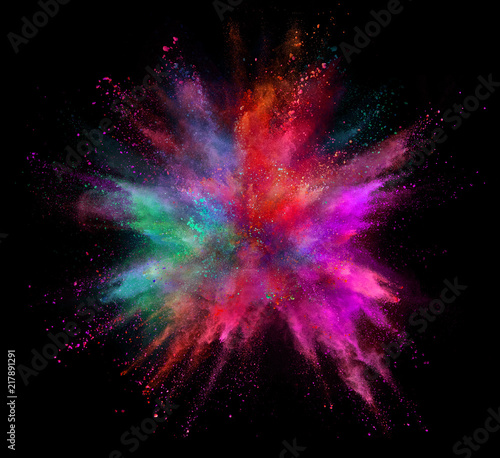 Coloured powder explosion isolated on black background