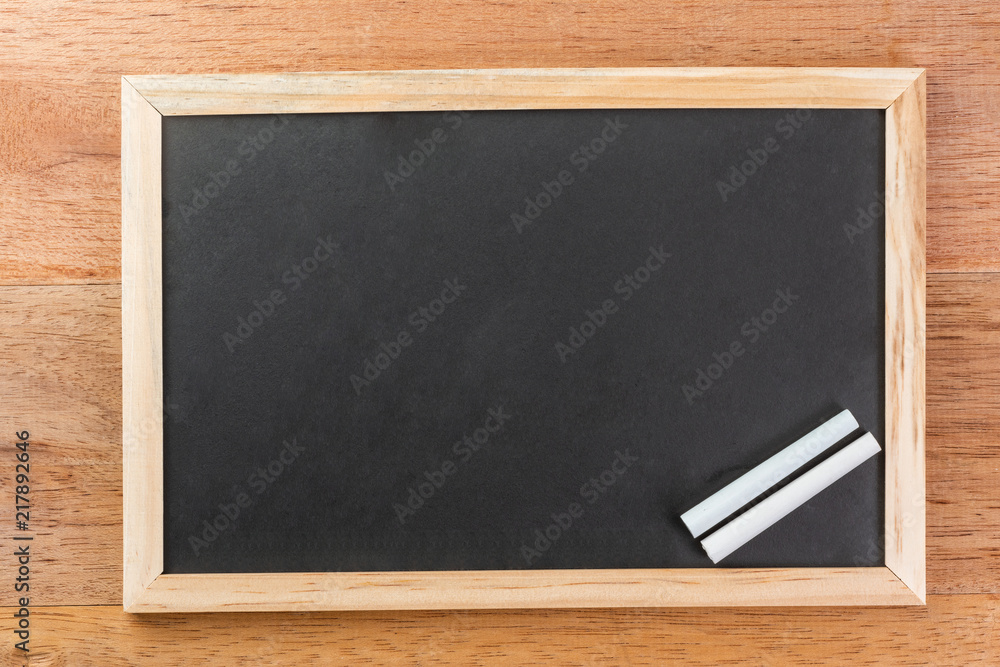 rectangle blank slate chalk board with wooden frame on wooden table rectangle blank slate chalk board with wooden frame on wooden table