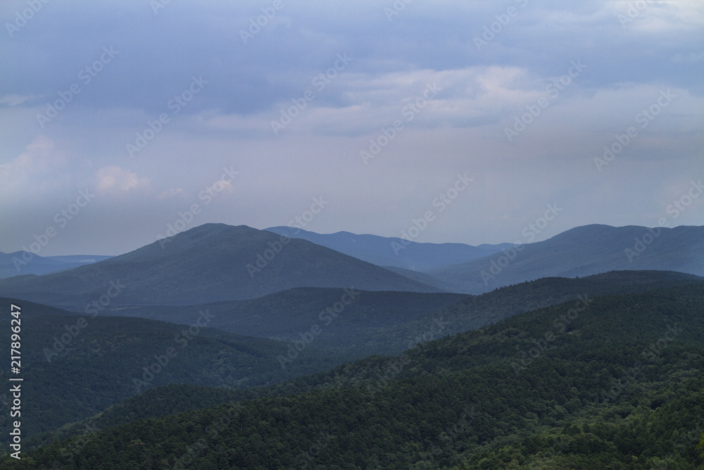 Mountain vista in blue and gray