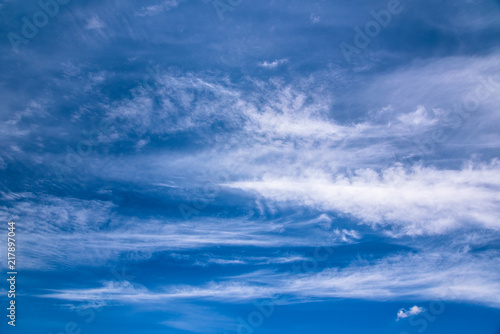 Spindrift clouds on blue sky