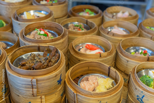Variety of dim sum steamed in bamboo basket. Chinese breakfast style in southern of Thailand. © suwanb