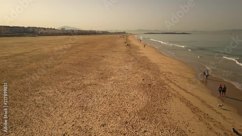4K Aerial View Of People Walking On The Beach At Gibraltar