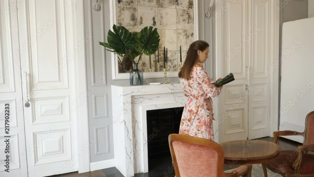 Young woman reading magazine at home Young woman reading magazine at home