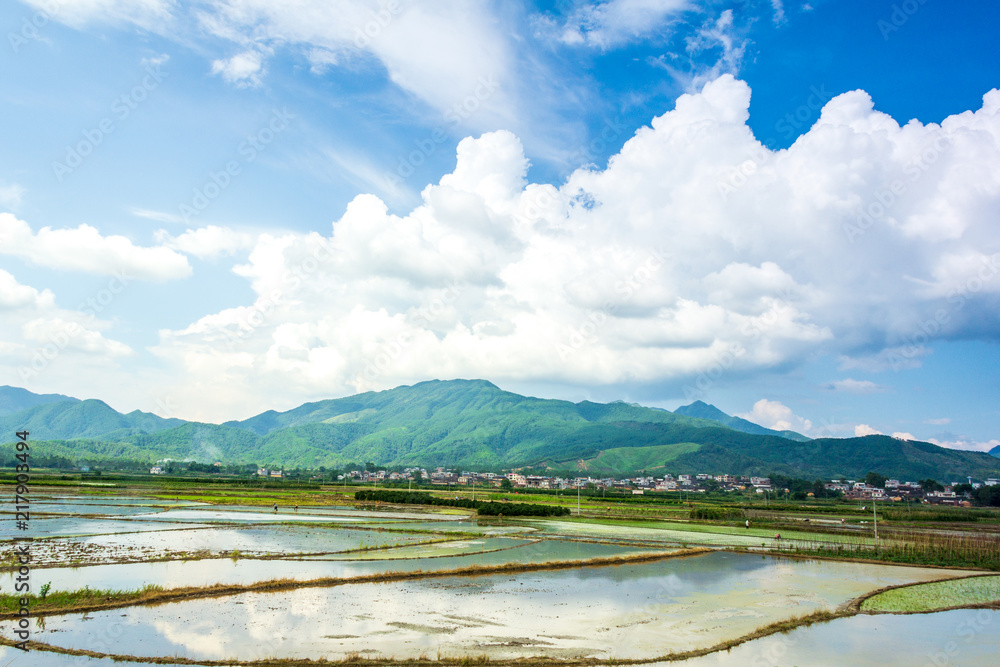 Pastoral villages under blue sky and white clouds
