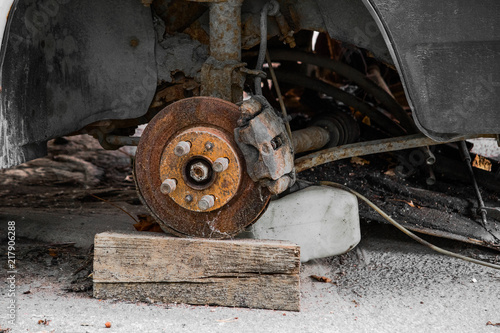 Rusty wheel and brake shoe car
