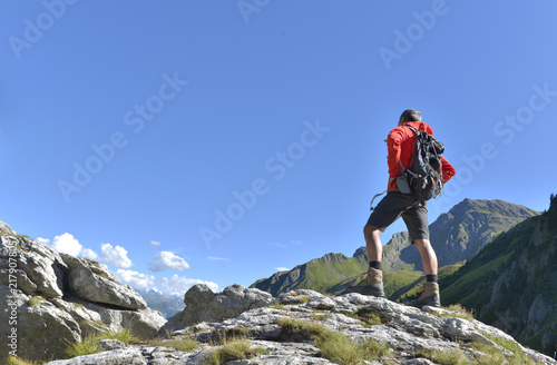 hiker on peak mountain