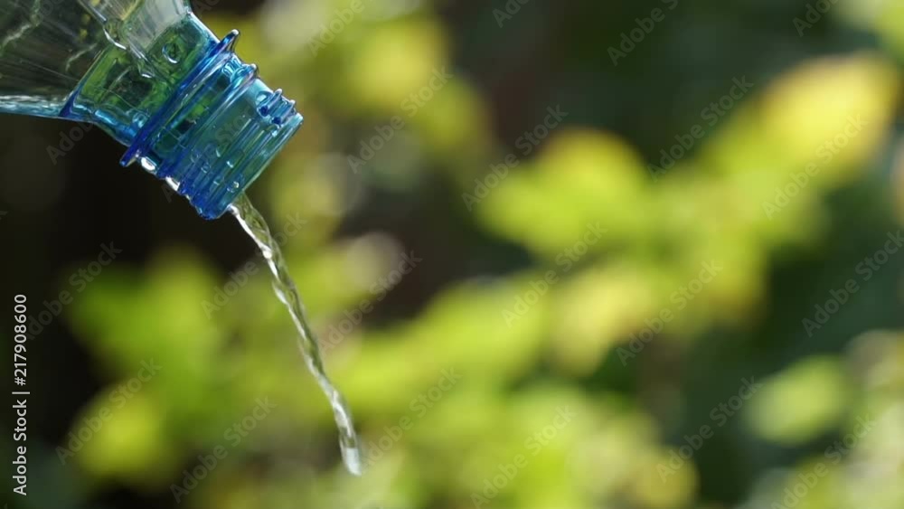 Drop a drop of water from an empty plastic bottle. Drop a drop of water from an empty plastic bottle.