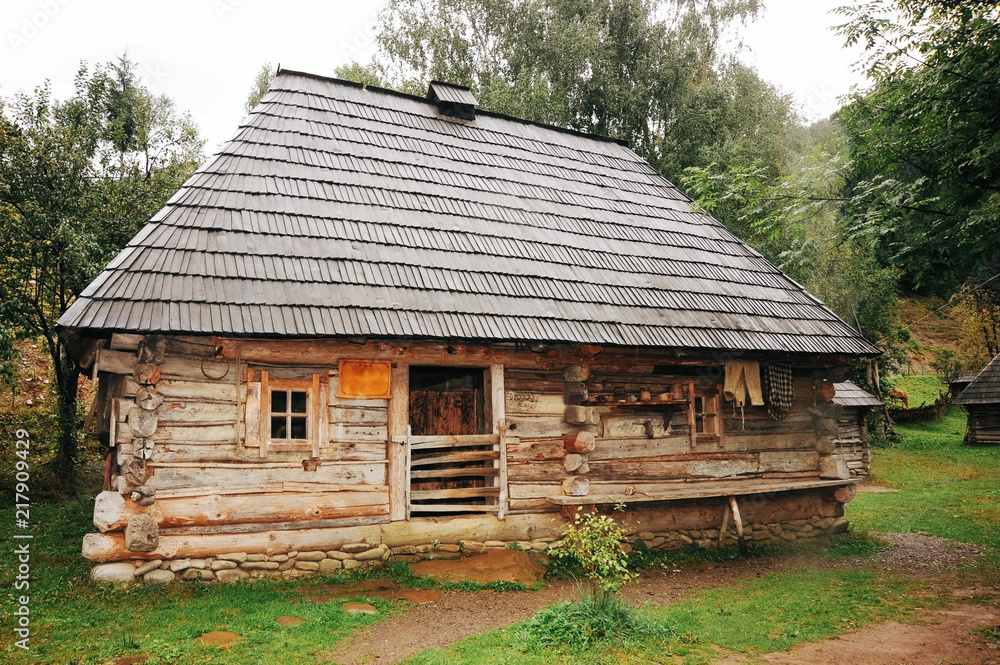 An ancient fairy-tale house of wood is on the outskirts of the village. It is evident that nobody lives there yet