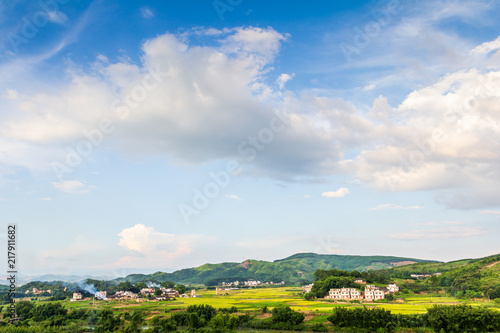 Pastoral villages under blue sky and white clouds © 象波 张
