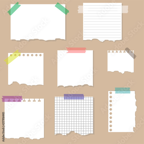 Paper torn page notes. Papers of different size glued to wall with tape
