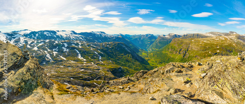 Fototapeta Naklejka Na Ścianę i Meble -  Panoramic view from Dalsnibba on Nibbevegen road leading down to Geiranger Fjord in Norway