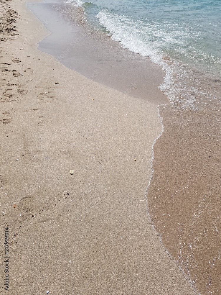sandy beach and clear blue water sandy beach and clear blue water