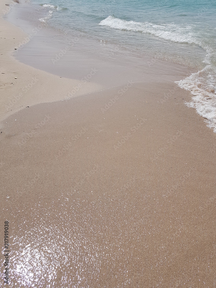 sandy beach and clear blue water sandy beach and clear blue water
