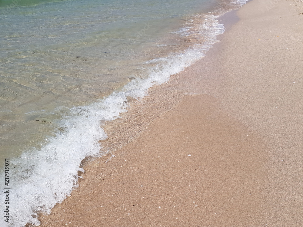 sandy beach and clear blue water sandy beach and clear blue water