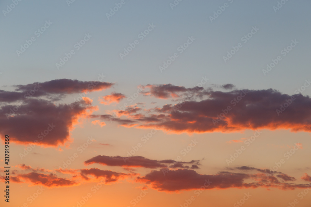 Background of colorful sky concept: Dramatic sunset with twilight color sky and clouds.