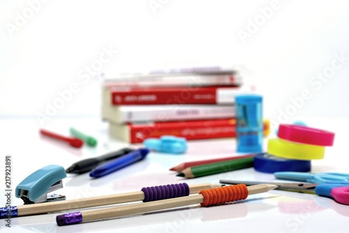 Back to school concept-close up of school supplies on a white background.