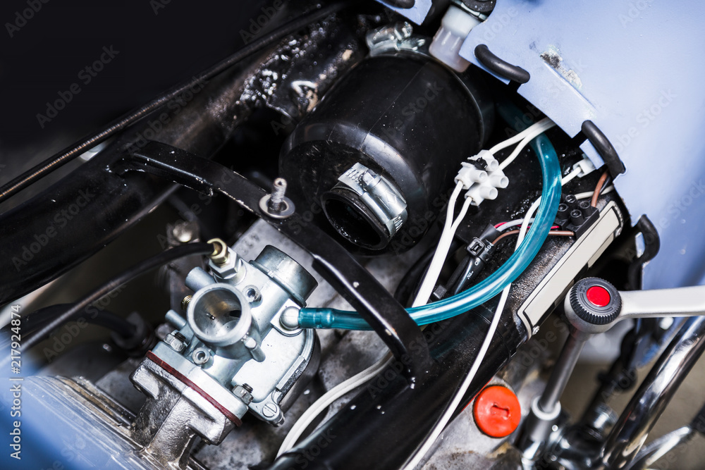 Obraz premium Old retro dirty black motorcycle engine close-up