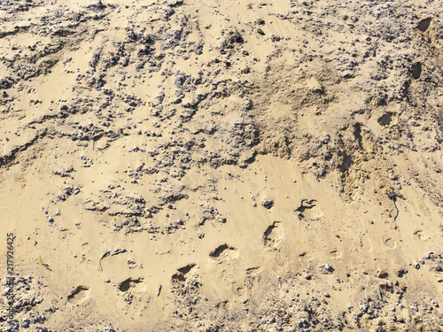 big pile of sand and footprints photo