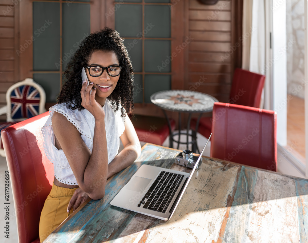 Businesswoman working from home on the mobile phone Businesswoman working from home on the mobile phone