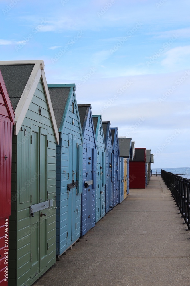 Naklejka premium beach huts so colourful.mudesley norwich england