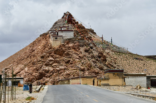 China, Tibet, Chiu Gompa monastery on a hill on the shore of lake Manasarovar photo