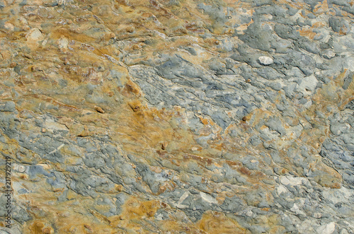 Micro-hulled texture of ferruginous argillite close-up photo