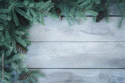 Tableau sur toile Christmas natural firbranch with cones on old wooden rustic background with copy