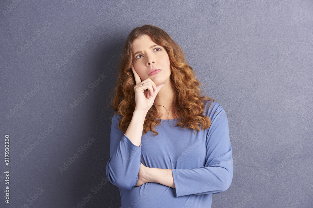 Thinking young businesswoman portrait Thinking young businesswoman portrait