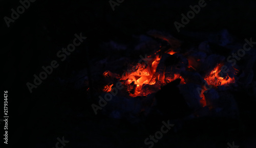 flaming coals in the black of the night.. © chermit