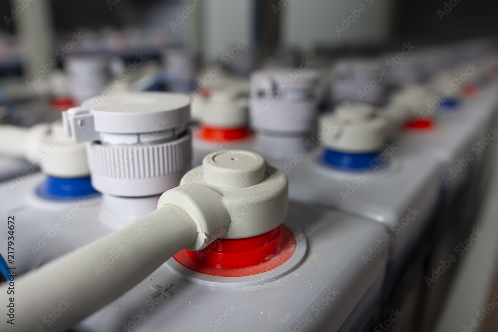 Rows of batteries in industrial backup power system. Battery pack in battery room in power plant. Supply electricity in plant during shutdown phase.