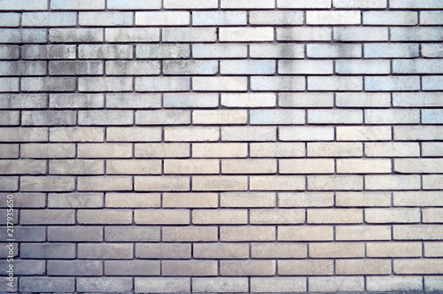 texture of a brick wall background in the countryside . rough blocks of stone brick masonry horizontal . architecture wallpaper.