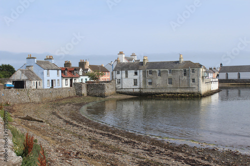 View of the picturesque harbour and surrounding buildings at the Isle of Whithorn in Dumfires and Galloway in Scotland. One of the most southerly ports in Scotland. © Imladris