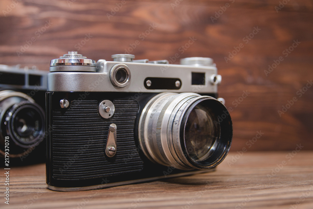 retro camera on wooden background, retro style image
