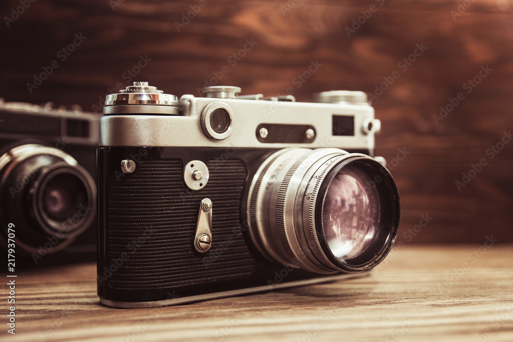 retro camera on wooden background, retro style image